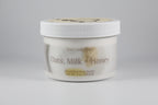Jar of 'Oats, Milk + Honey' emulsified body butter on a gray background