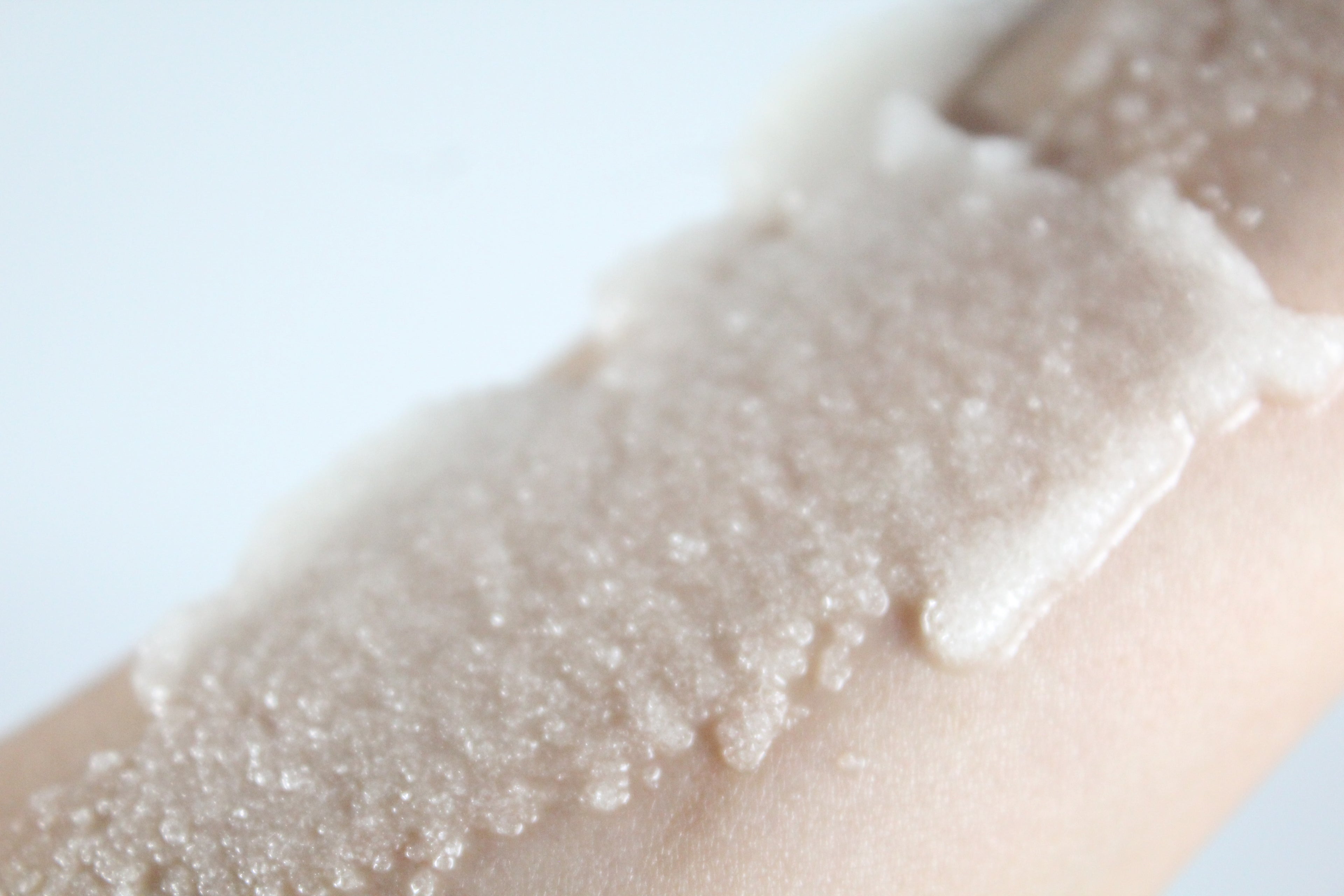 Close-up of a skincare product being applied to skin