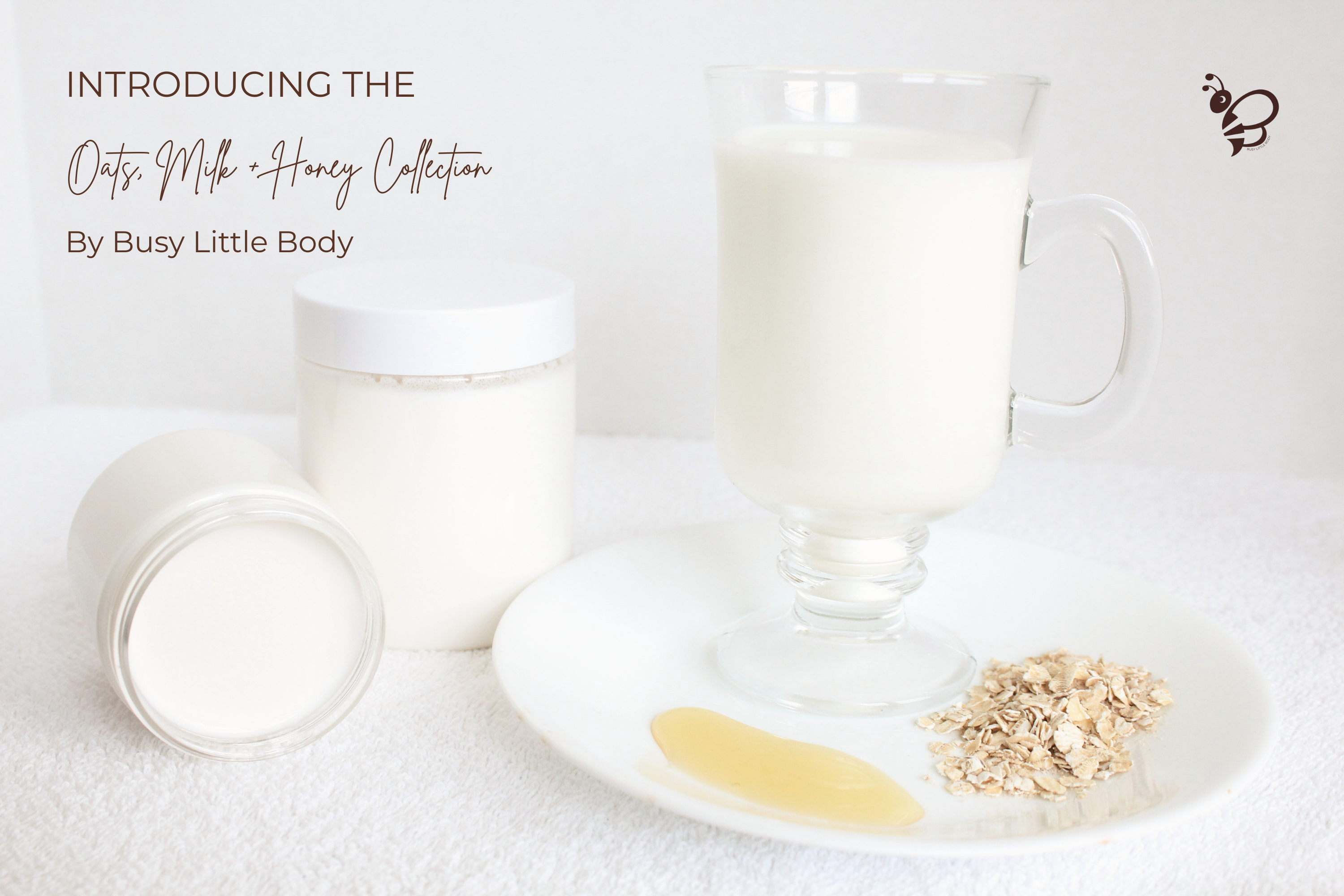 Glass of milk with oats and honey on a white surface, featuring 'Oats, Milk & Honey Collection' by Busy Little Body.